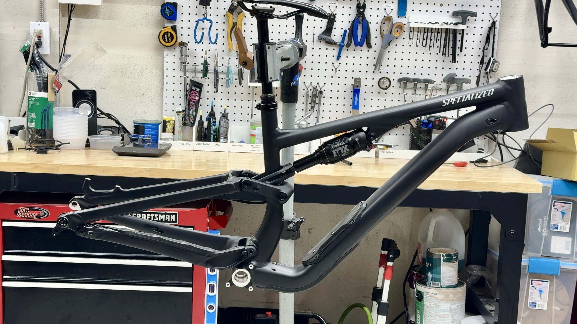 2025 Specialized Stumpjumper 15 Alloy frame in raw aluminum finish, ready for component swap in workshop setting